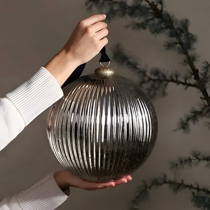 a giant silver bauble