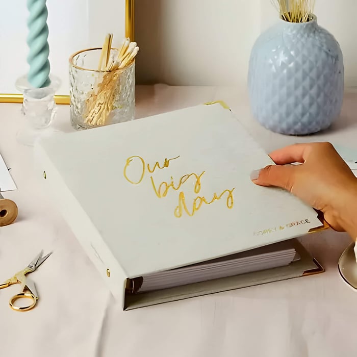 a pale green wedding planner book