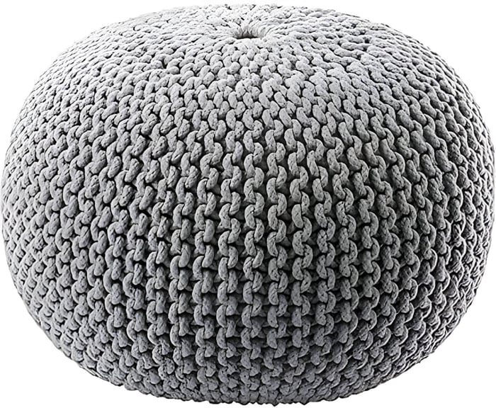 a grey knitted ottoman