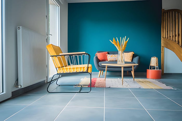 a bold blue feature wall in a living room