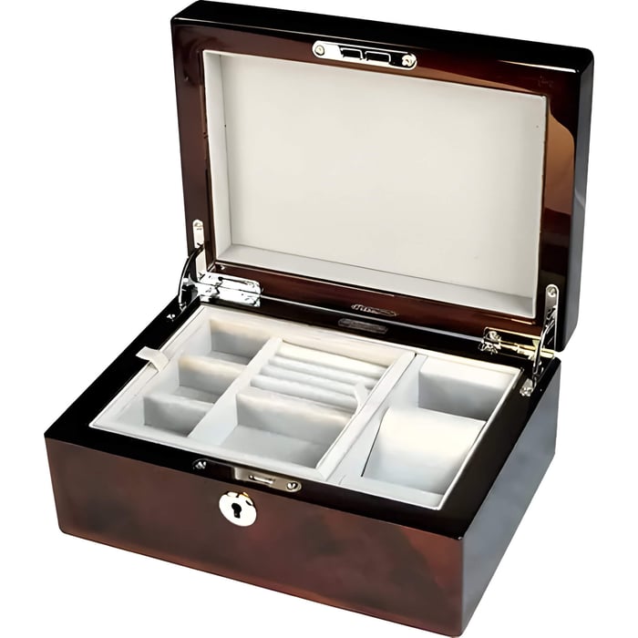 a dark walnut colour jewellery box with cream suede lining