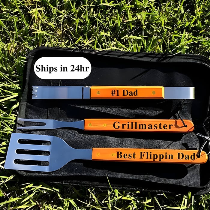 a wooden handled bbq set with personalised message