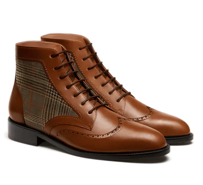 A pair of brown leather and tweed boots
