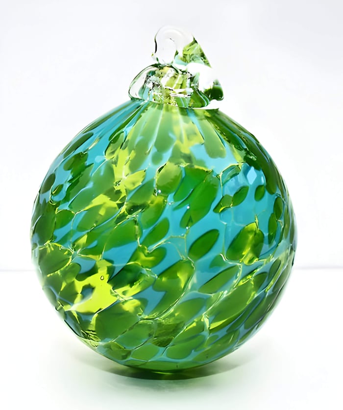 a green and blue hand blown glass bauble