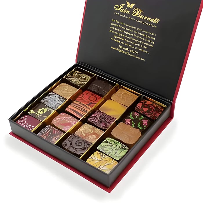 multi coloured chocolates in a red and black box
