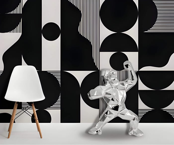 black bold wallpaper with a chrome gorilla sculpture