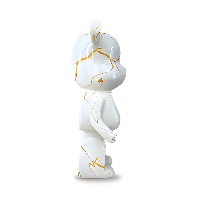 Golden luster bear sculpture side view