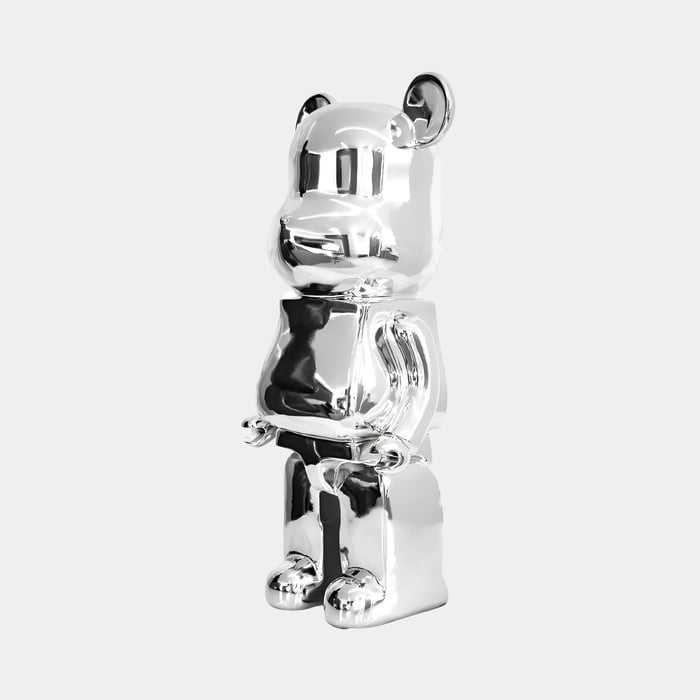 a chrome giant bear sculpture