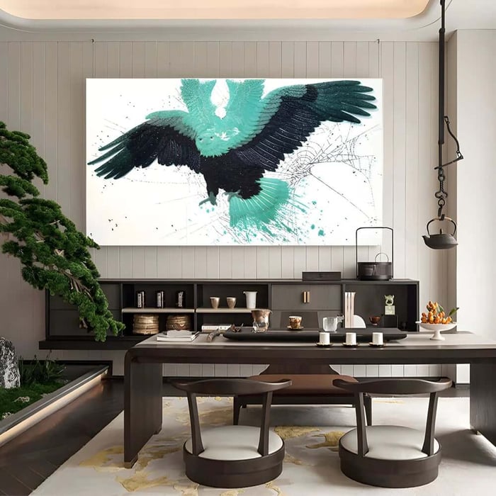 Large abstract bird painting in teal and black above a modern dining table in a minimalist room.