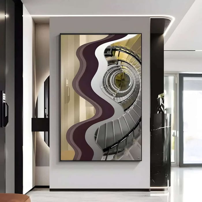 Modern hallway with framed abstract architecture print showing a spiral staircase and wave shapes.
