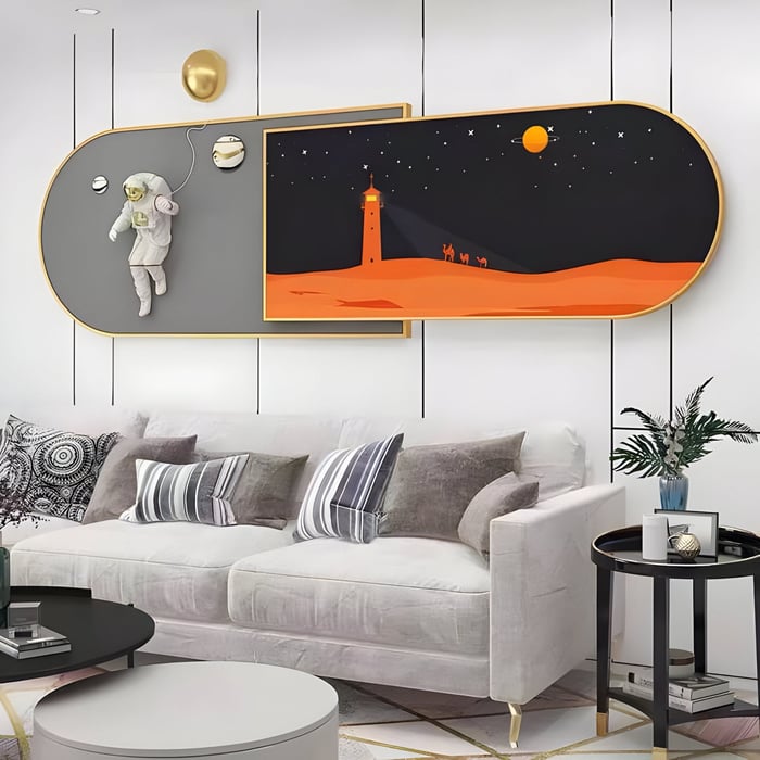 Space Astronaut Wall Art – Astronaut-themed mixed media art in orange and grey brings whimsy to a bright lounge.