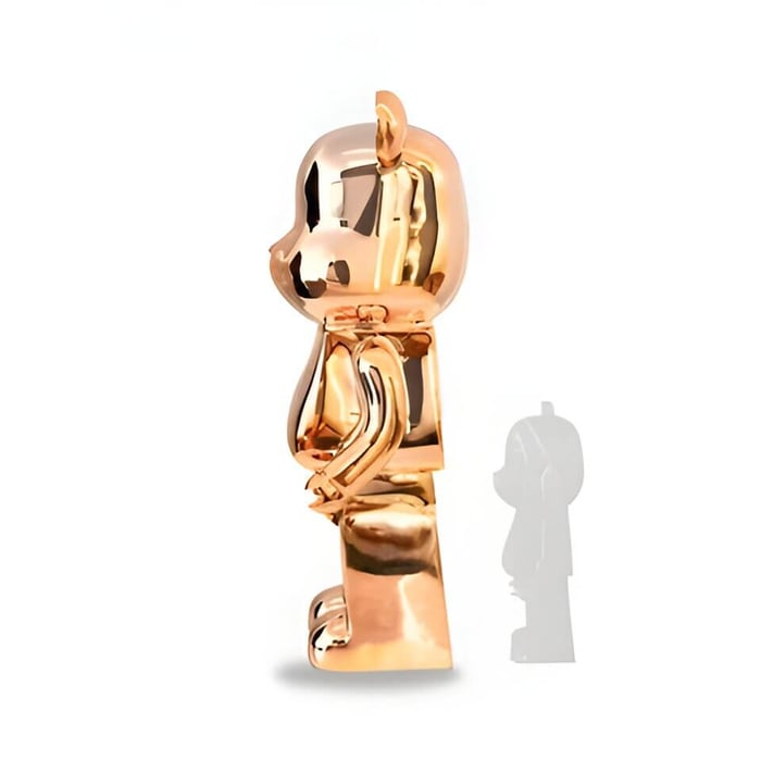 A rose gold giant bears sculpture angled view