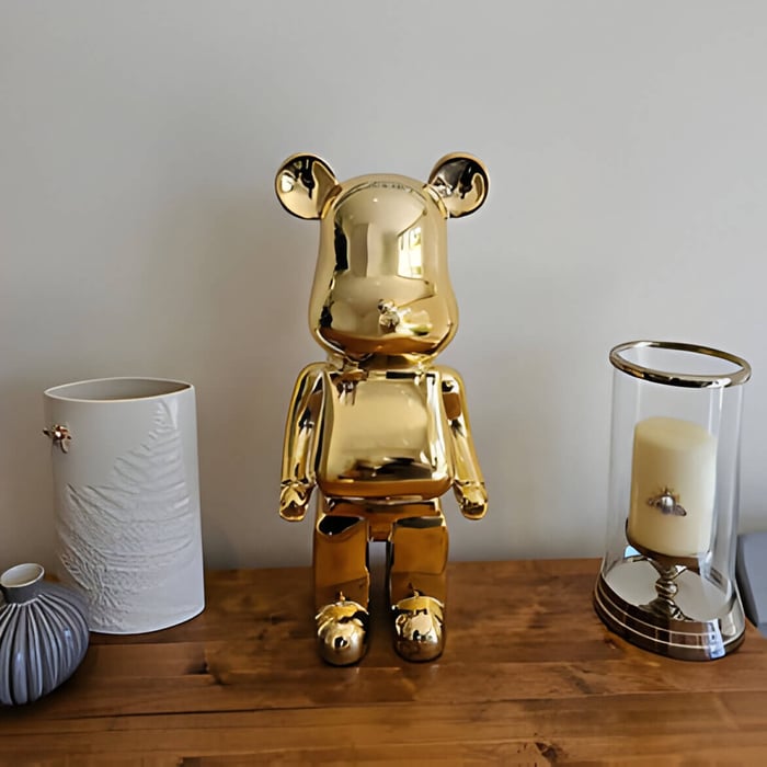 a gold giant bear sculpture in a home