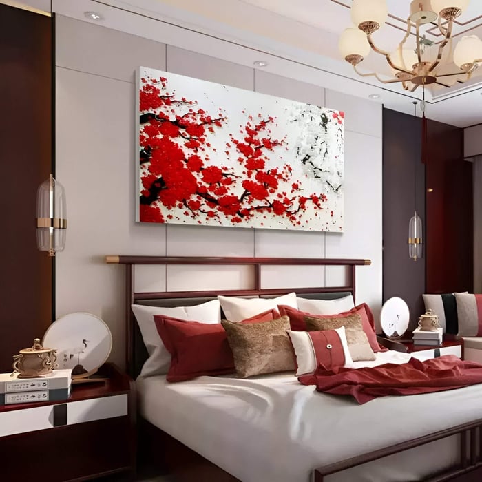A modern bedroom featuring a Red & White Blossom 3D Button Wall Art above the bed, complementing the red and neutral decor with an elegant Asian-inspired floral design.