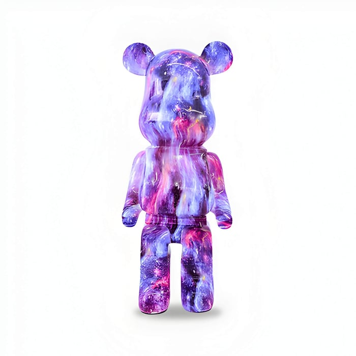 a pink, purple and blue giant bear sculpture