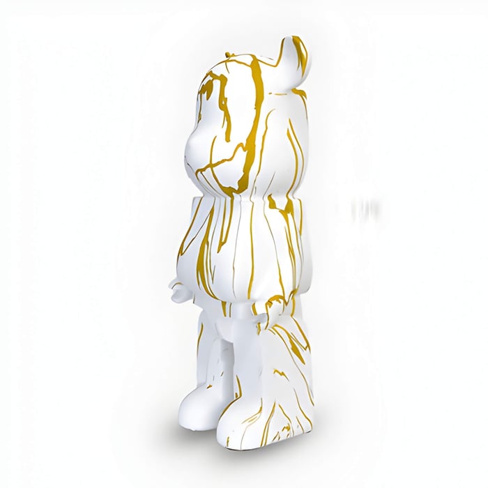 a white and gold giant bear sculpture