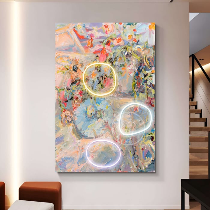 Colorful Abstract Art with Neon Rings – A vibrant abstract painting with glowing neon rings, mounted in a contemporary interior.