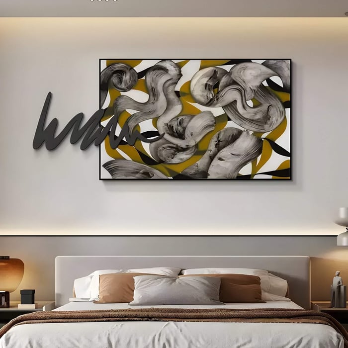 Energetic wall art with swirling grey and mustard shapes and bold black graffiti accents, giving a modern, artistic edge to a minimalist bedroom.