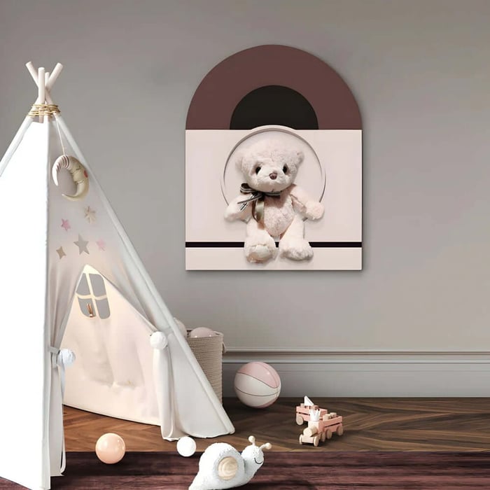 Children’s playroom with a teepee and a wall artwork featuring a teddy bear on a modern geometric backdrop.