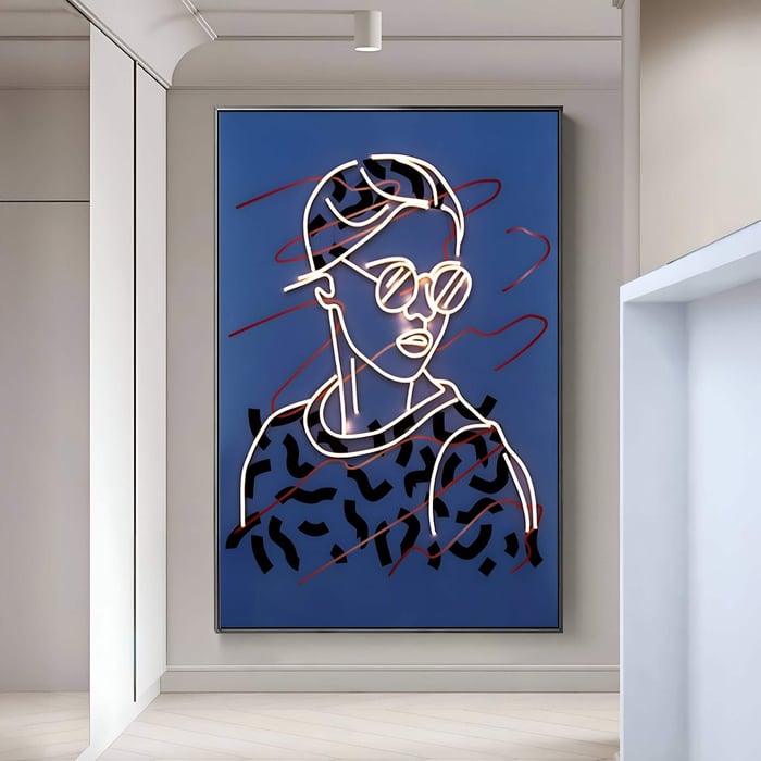 Giant Sculptures Polaris Urban Vogue Crystal Porcelain 3D LED Wall Art features a stylized portrait with neon-outlined sunglasses against a blue backdrop and red squiggly lines, perfect for vibrant illumination in a minimalist hallway.