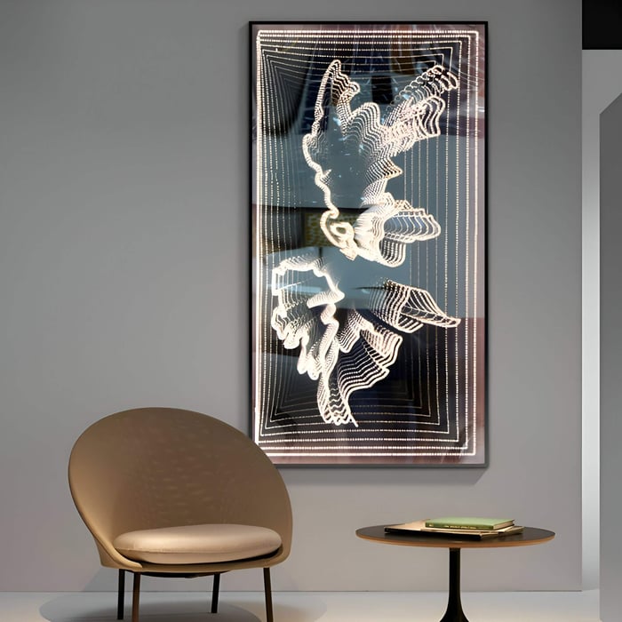 The Horizon Butterfly Harmony 3D LED Mirror Wall Art by Giant Sculptures, featuring illuminated lines for a flying objects illusion, adorns the wall. Below it, a beige chair and circular table with a book enhance the minimalist setting.The Horizon Butterfly Harmony 3D LED Mirror Wall Art by Giant Sculptures, featuring illuminated lines for a flying objects illusion, adorns the wall. Below it, a beige chair and circular table with a book enhance the minimalist setting.