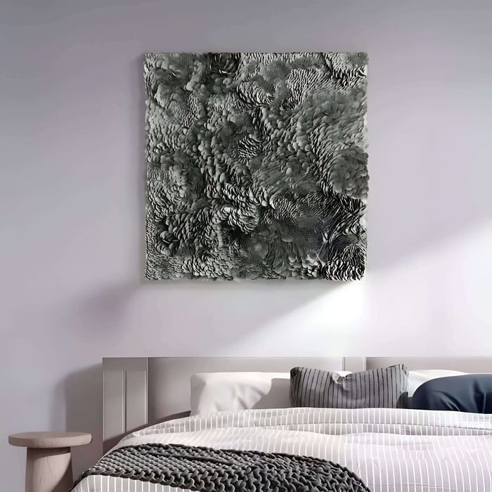 Grey abstract leather wall art panel with dense feather-like texture above a modern bed.