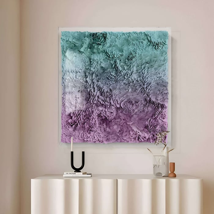 Large teal to purple gradient leather wall art with intricate petal-like texture in a contemporary room.