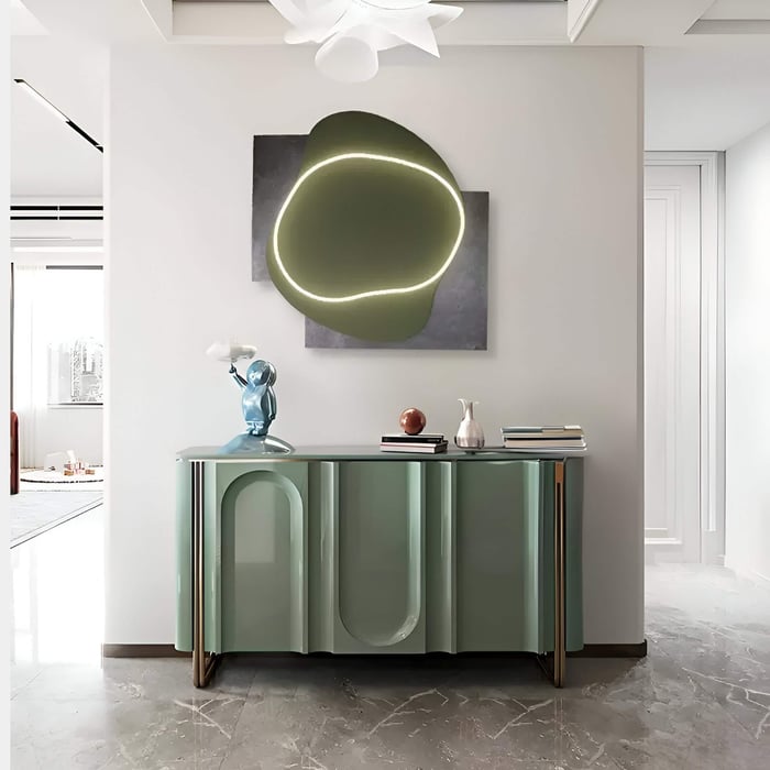 Contemporary entryway with abstract green and gray wall art featuring integrated LED lighting.