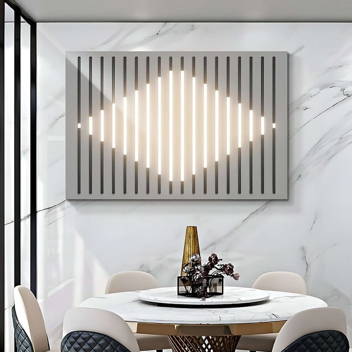 Modern wall panel with glowing diamond-shaped LED lights in vertical slats above a marble-top table.