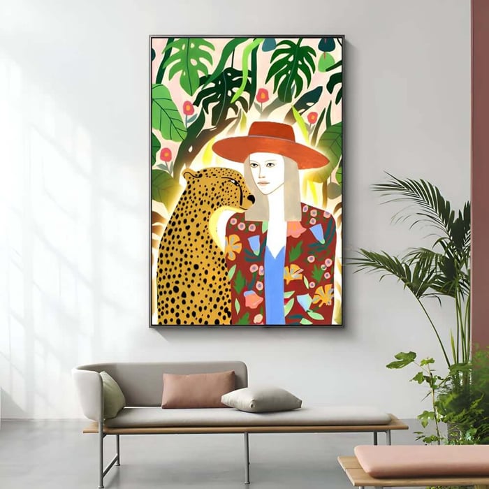 Airy modern space with a low daybed and a large vibrant illustration of a woman in a red hat beside a cheetah, surrounded by lush tropical leaves.
