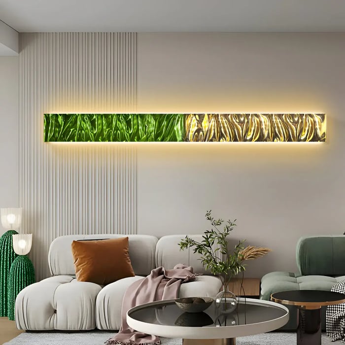 A contemporary living room with a striking horizontal LED-lit wall panel featuring textured green and gold living room art, adding a dramatic focal point above a plush seating arrangement.