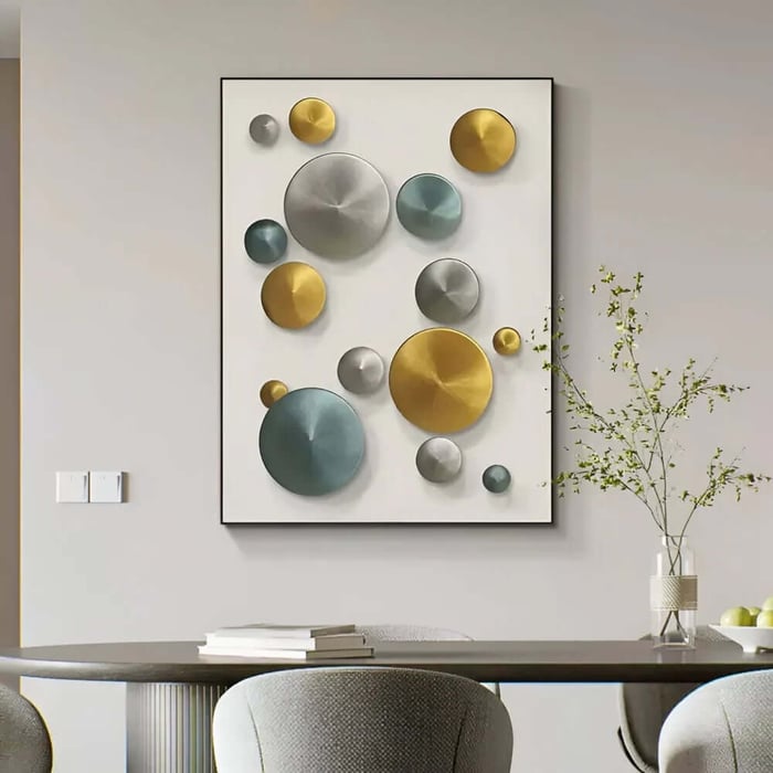 Contemporary dining room wall art with metallic circular shapes on white panel.