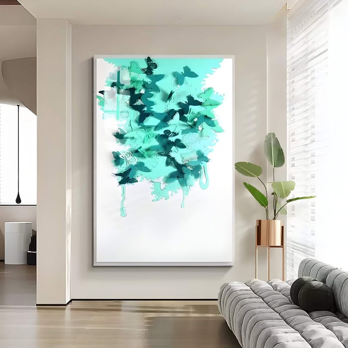 Aqua Butterfly Wall Art – Glossy teal butterflies in flight on a white backdrop near a grey couch with sunlight.