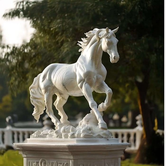 Elegant white marble horse statue captured in mid-gallop.