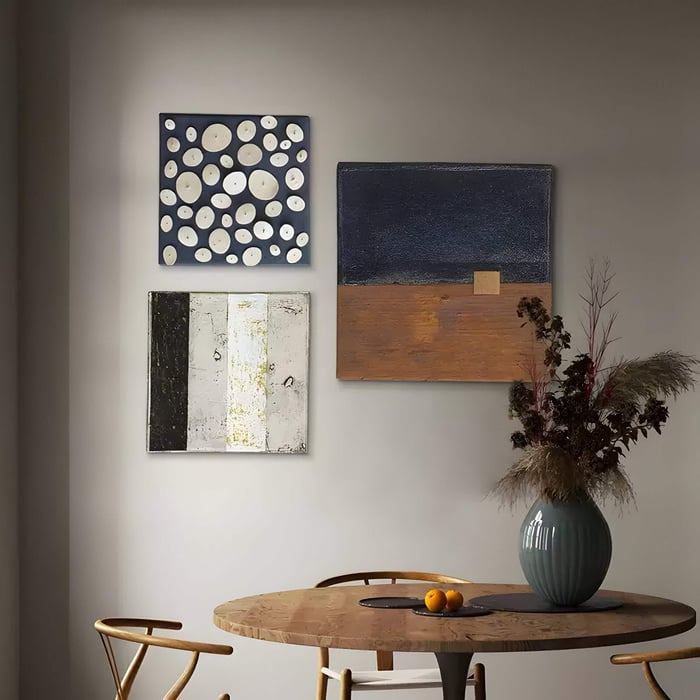 Kora Timber Fade Modular 3D Wall Art set displayed in a modern dining space with wooden round table, light chairs, and decorative vase.