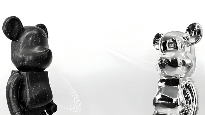 A stone stone and Chrome Giant Bear sculpture