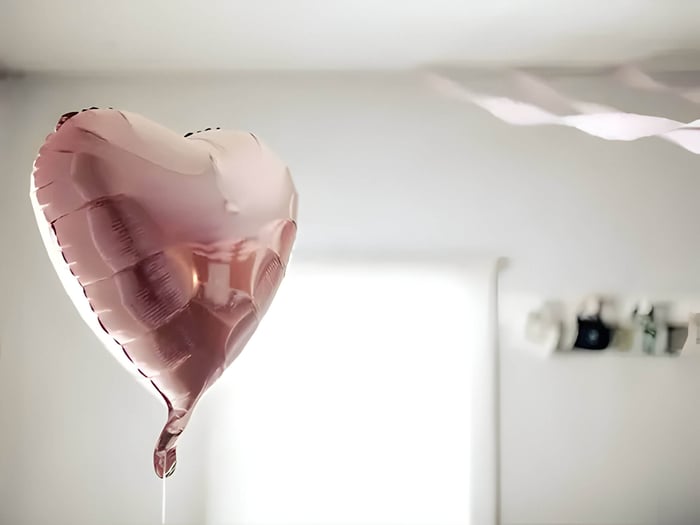 A pink helium, heart shaped balloon for cute valentine's day ideas