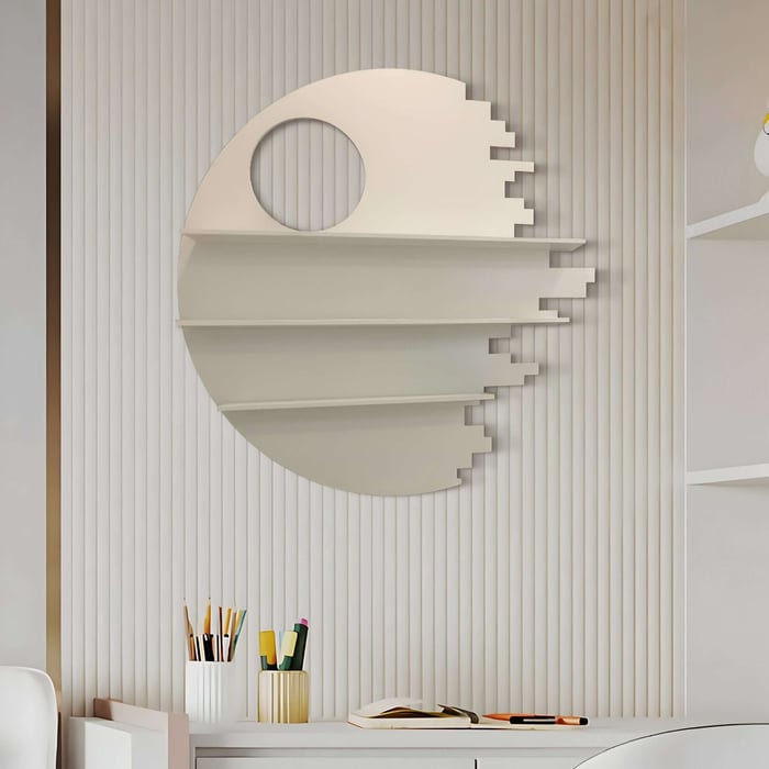 An Orbis White Geometric Multi-Tier Decorative Shelf by Giant Sculptures, reminiscent of a sci-fi space station, adorns the ribbed wall. Below it, a desk holds pencils, pens, a notebook, and an eraser. The room features minimalist modern design elements for a sleek contemporary look.