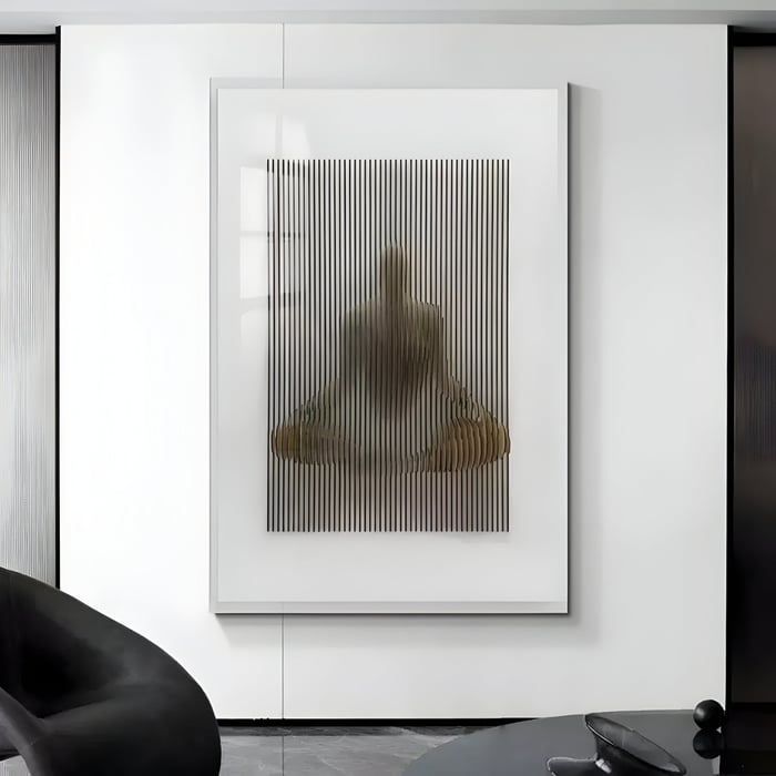 A cozy nook with a brown leather armchair is complemented by a modular wall display in grey, beige, and off-white tones—featuring abstract reliefs, this leather art ensemble evokes tactile warmth and contemporary calm.