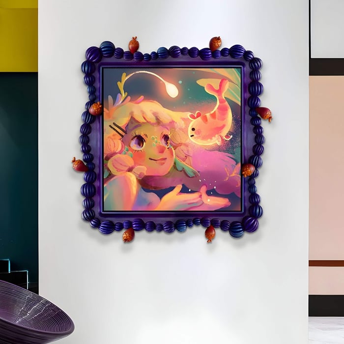 A vibrant Fabula Glowfish Encounter Anime 3D wood relief wall art by Giant Sculptures features a pink-haired girl and goldfish, surrounded by floating lights, displayed in a decorative purple frame with red ornaments on a white wall.