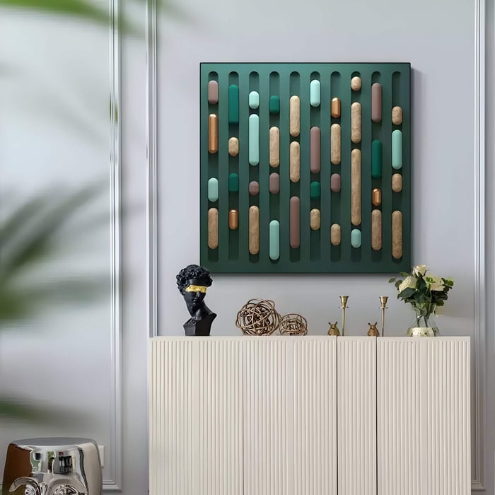 Vertical capsule-style 3D artwork in green, gold, and pastel tones adds modern dimension to a contemporary styled console space.