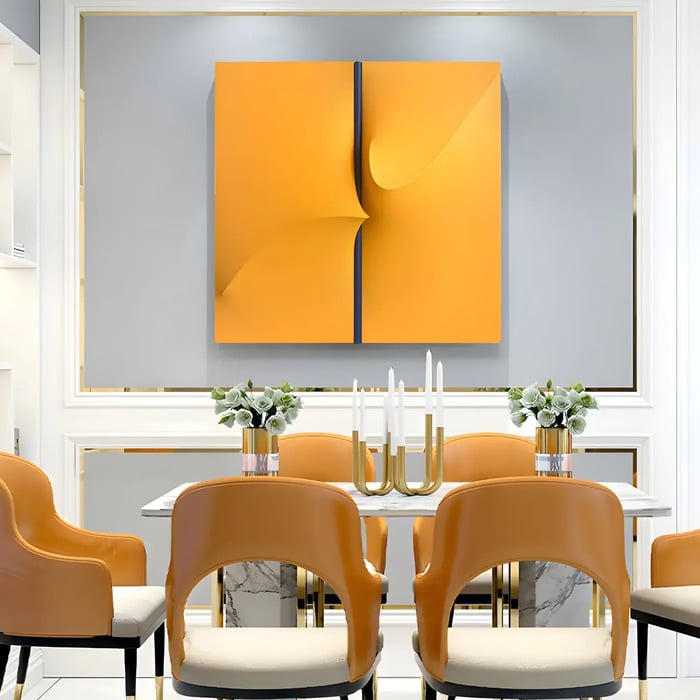 Bold yellow square wall sculpture in dining space – A contemporary dining area with a vibrant yellow abstract wall panel above a modern dining table.