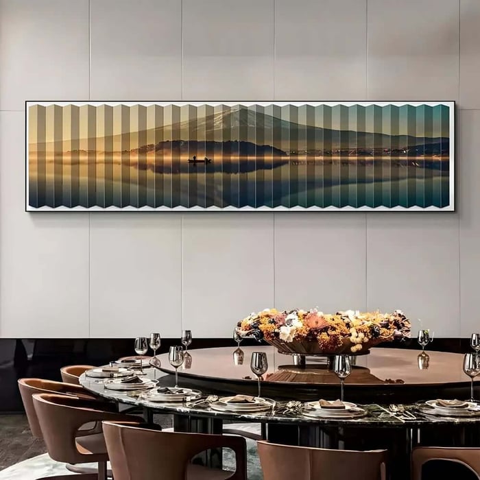Wide Zen landscape artwork of misty mountains and lake with geometric panels above a round dining table.