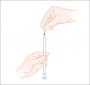 Fixing the boric acid suppository on your insert tool.