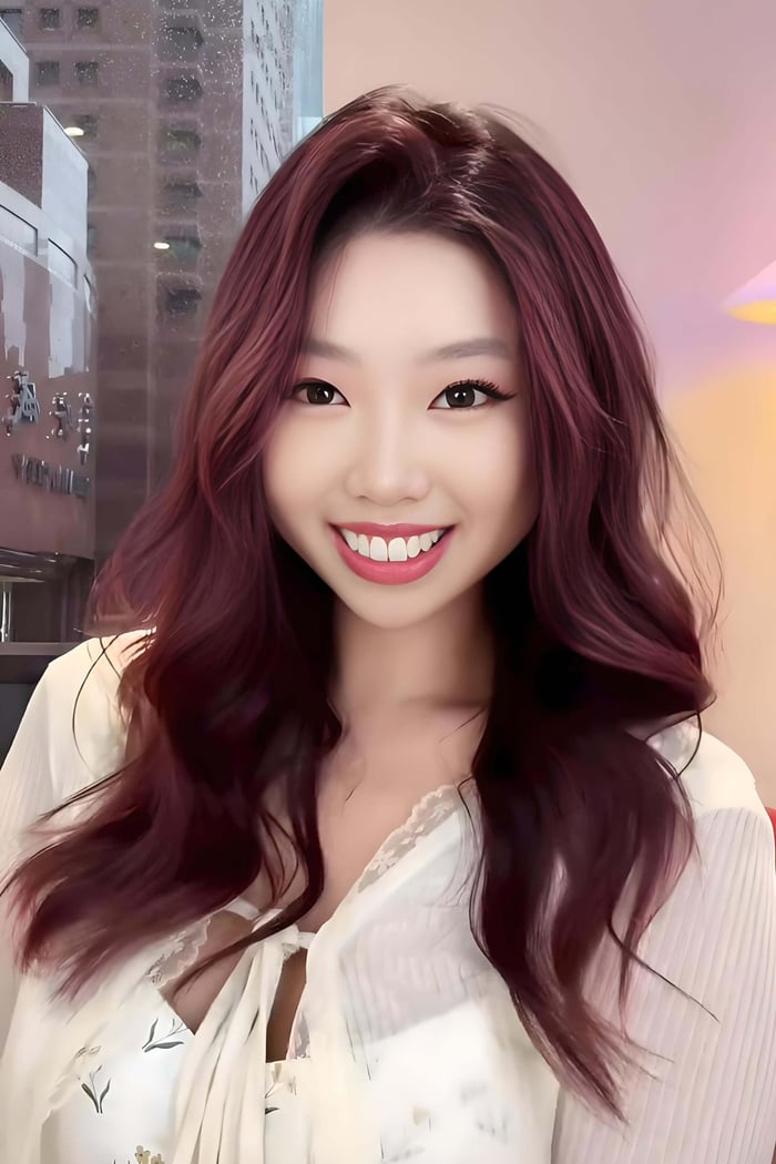 The Air Touch Balayage technique is a trending method for achieving subtle, yet impactful color with a natural and luminous effect, perfect for those seeking a low-maintenance way to add dimension and shine to their hair with subtle pops of color like magenta.