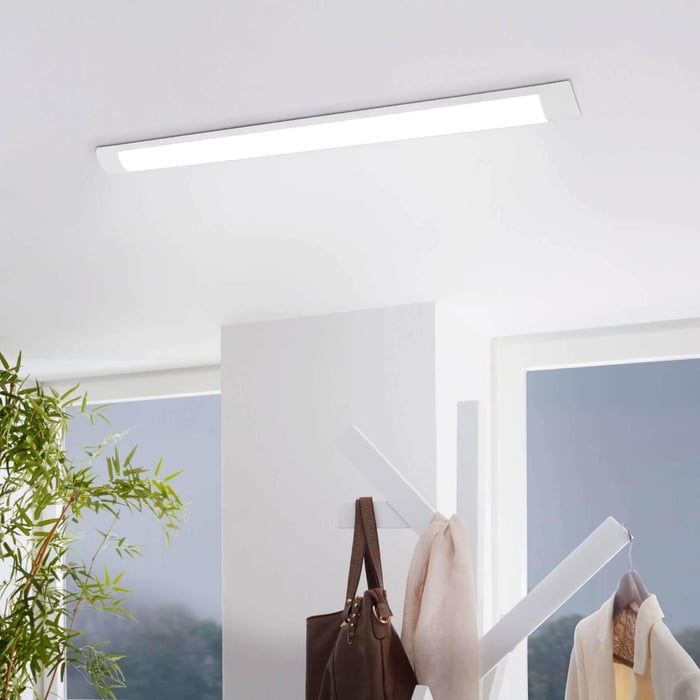 Batten Lights ceiling fitting producing bright practical light in a room.
