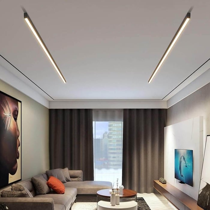 Batten Lights in a modern living room ceiling with two slim linear fittings.