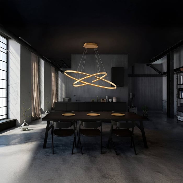 Futuristic LED ring chandelier glowing over a dark industrial-style dining space.