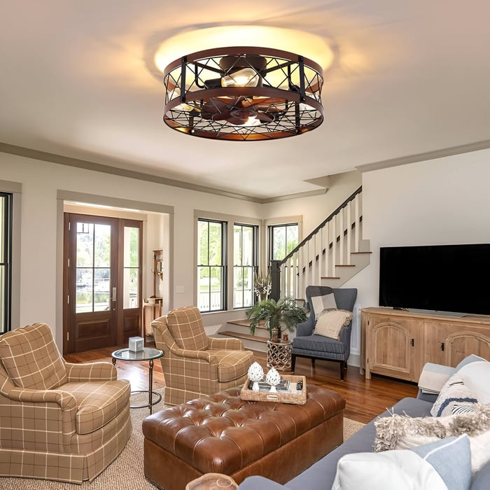 Rustic caged ceiling fan with integrated light in a cozy traditional living room.