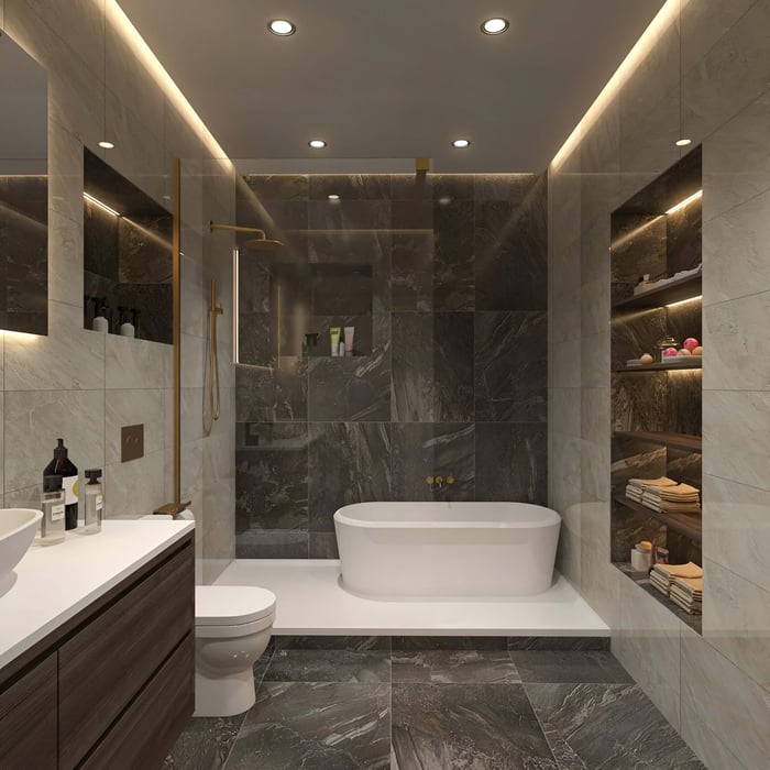 Modern bathroom with a freestanding tub, marble walls, built-in shelves, and warm recessed lighting for a spa-like ambiance.